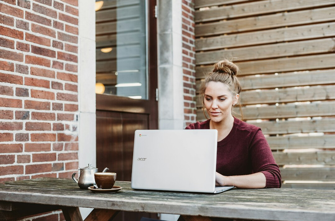 person using laptop insurance