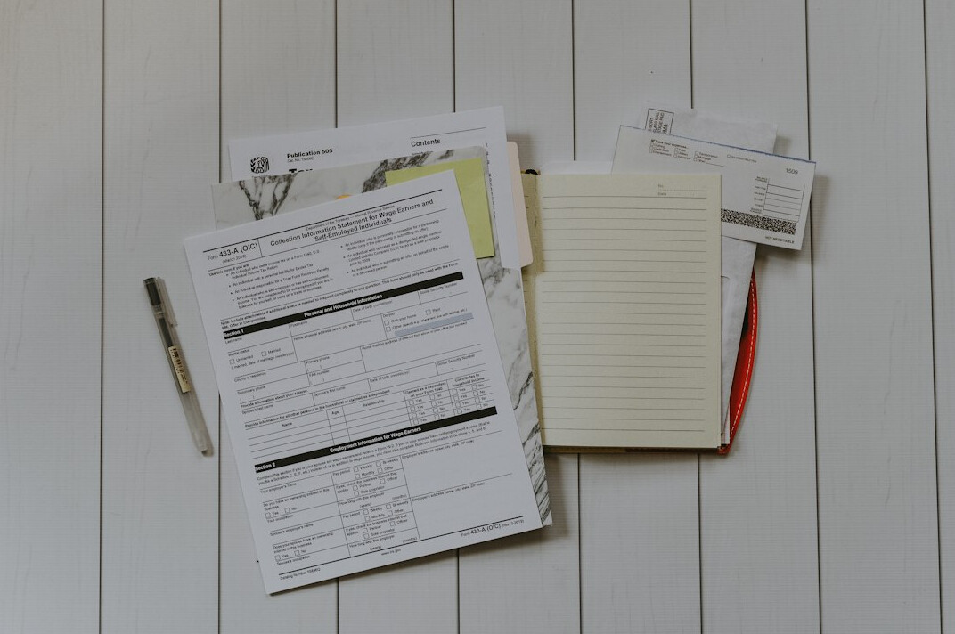 paper insurance documents stacked