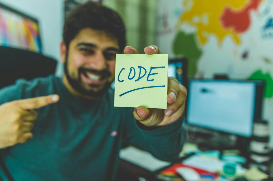 programmer writing insurance code