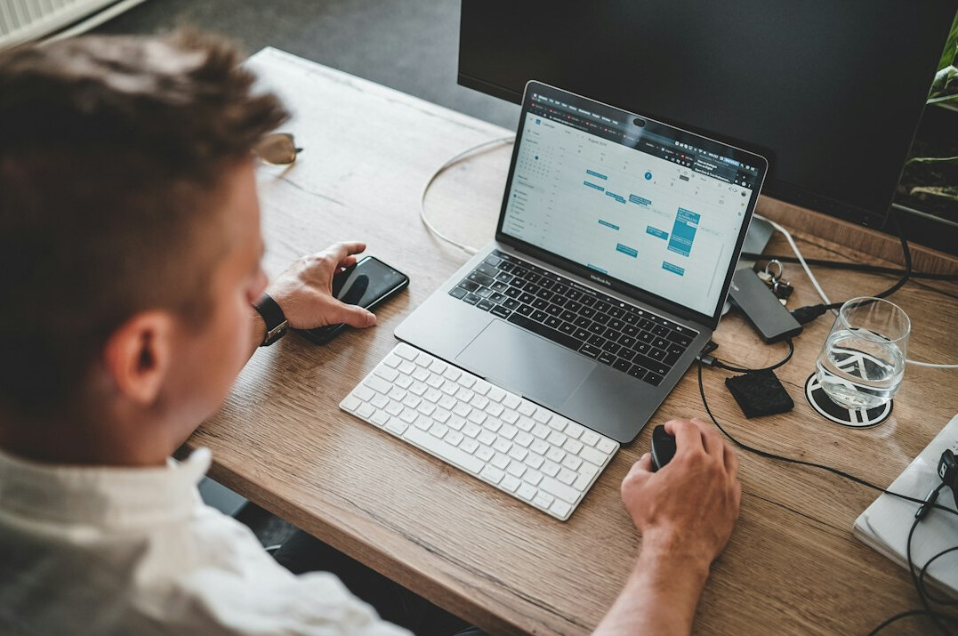 programmer working on laptop