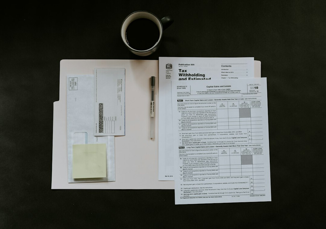 paper insurance documents stacked